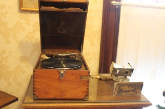 A phonograph, and a stereoscope viewer.